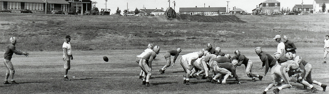 1946 Coach Fran Rish coaching the punting special teams squad